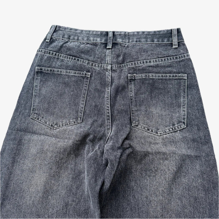 BLACK WASHED JEANS.